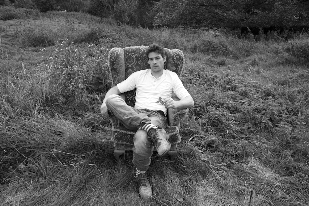 Danny Griffin sitting in an armchair outdoors